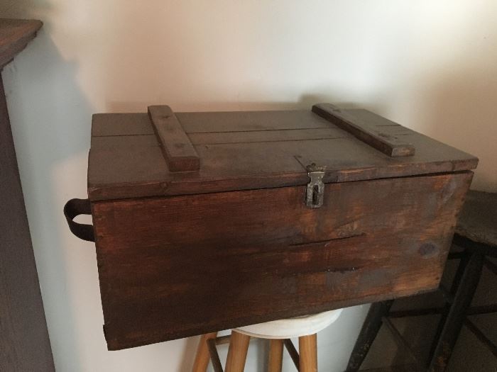 Many small and large trunks and wooden boxes