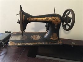 Antique sewing machine and table
