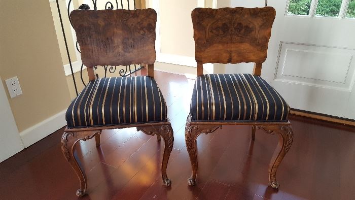 A pair of lovely American burl-wood chairs.