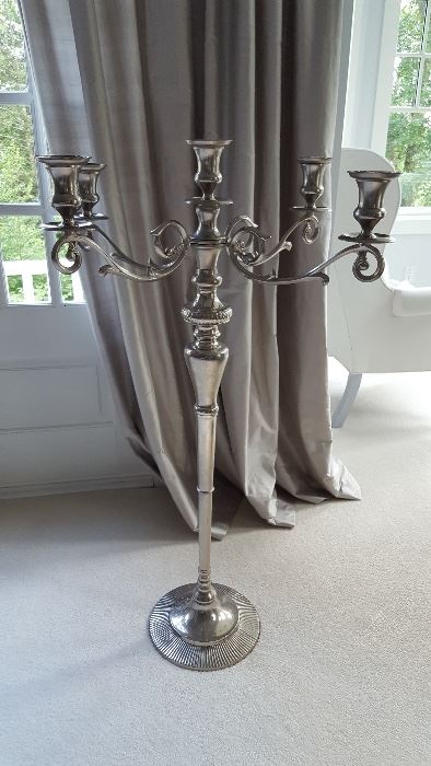 Large-scale candelabra (look at the wing-back chairs in the background for scale).