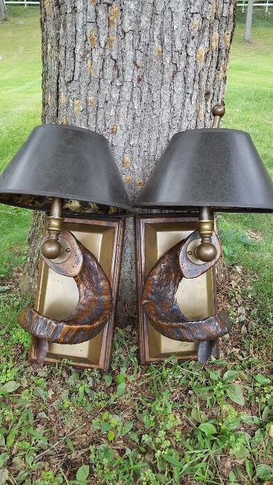 Fabulous horn sconces -- the horns are crafted from wood but look real -- there is a small slice off the bottom of one horn but it doesn't impact the overall look. Buy these for your library, your mantel or for  either side of your headboard!