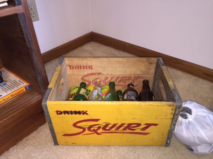 Vintage squirt crate with bottles, etc.