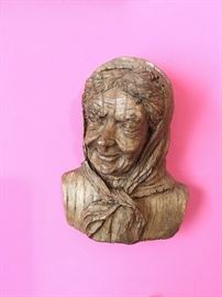 Wooden carving of lady