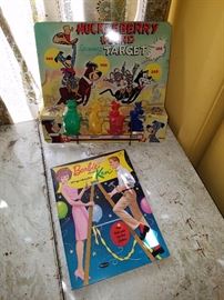 Tin target and unused coloring book