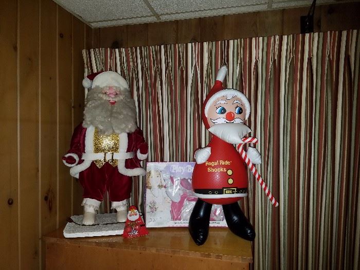 1950s store display mechanical sale santa that works and a Napa blow up vintage santa