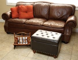 The sofa and magazine rack sold.