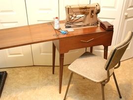 Vintage Singer sewing machine and chair
