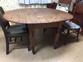 oak dropleaf table -- chairs sold separately