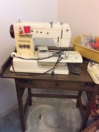 sewing machine/sewing machine table -- sold separately