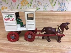 Cast iron milk wagon with driver
