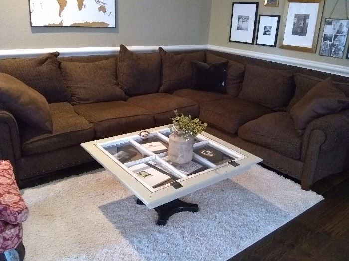 Brown Microfiber sectional with custom design window frame coffee table