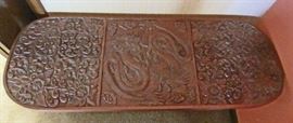 Detail of top on Asian carved table