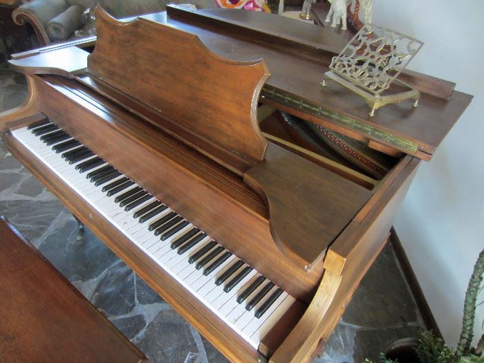 Manufacturer decal removed when the piano was refinished