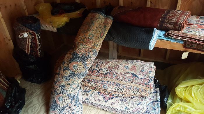 over 25 antique carpets