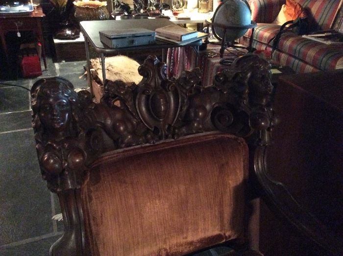Incredible carved chair! Gorgeous figureheads and gargoyles wonderfully executed! The absolute focal point for a room and comfortable too!