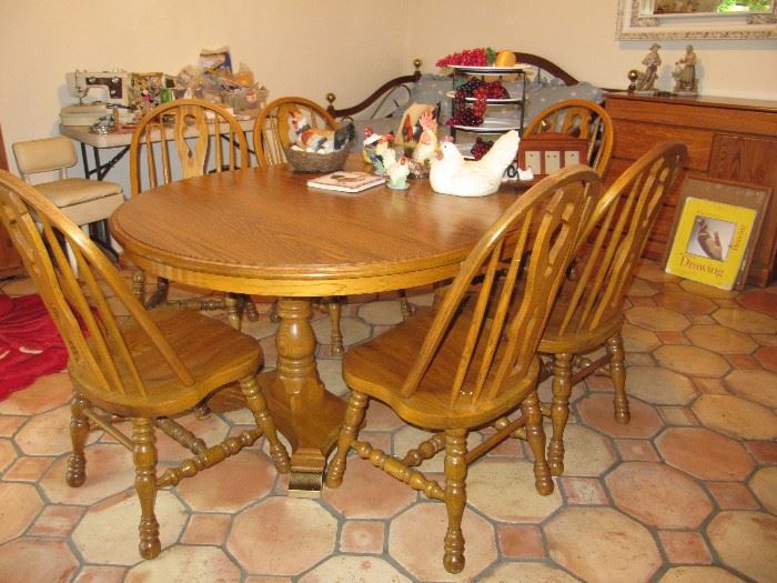 Oak dining table with six chairs