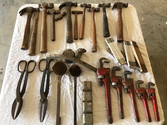 Vintage pluming tools, hammers, melting spoons, iron ingot