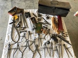 Vintage plumbing tools and tool box contents and tool box.