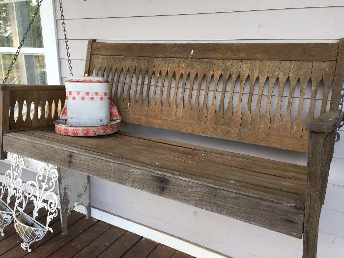Old porch swing, bird feeder