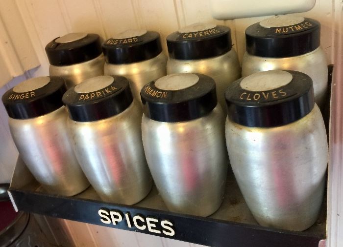 Complete set of tin spice canisters with shelf