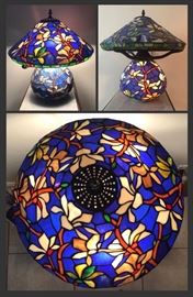 Gorgeous Bronze with Cobalt Blue stained glass lamp. 
Base and shade both illuminate 