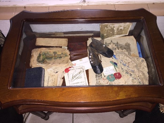 Antique family mementos in display table