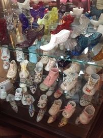 Large collection of porcelain shoes.