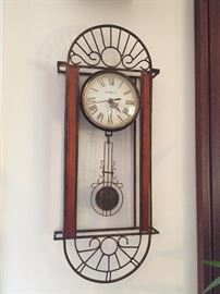 Brass and wooden clock.