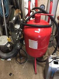 Large collection of power tools.