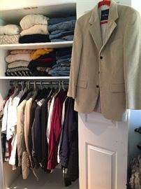 Large collection of men's clothes.