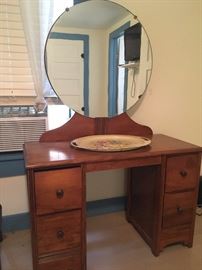 vintage round mirror and dresser