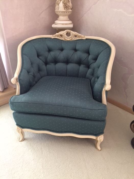 French Italian Provincial barrel tufted chair. There are two of this style, one in blue and one in gray. Can be used for the bedroom or formal living room. $300 each measurements seat to floor 18" 29"D x 32"H seat is 20" x 21"