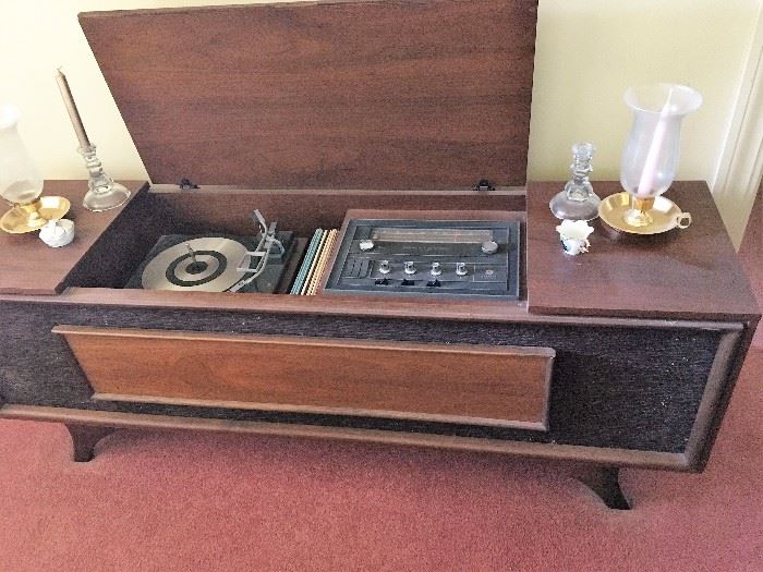 Nice stereo with radio in mid century modern cabinet.