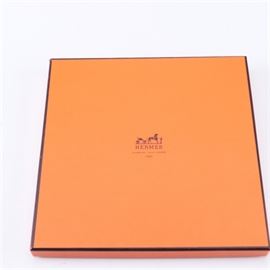 Hermès "Le Sacre du Printemps" Silk Scarf: An Hermes silk scarf. The colorful green and purple Le Sacre du Printemps scarf features an interconnected design of ribbons, flowers, vines and gold tone bows. The selection also includes the original orange Hermes box.