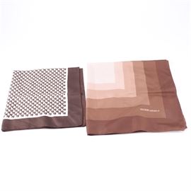 Pierre Cardin and Michelangelo Scarves: A pair of scarves by Pierre Cardin and Michelangelo. The Pierre Cardin scarf features a brown monogrammed print with a brown bordered and in-print branded logo to the corner. Also included is a larger scarf by Michelangelo in a geometric design in white to deep brown hues. “Ricardo di Padova” also appears in-print to a corner.