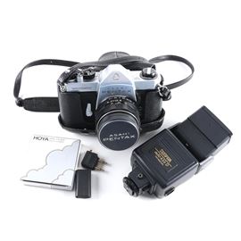 Pentax Asahi Spotmatic Camera And Sunpak Flash: A Pentax Asahi spot matic camera and Sunpak 443 D hot-shoe flash. 
The Pentax Spotmatic features a 50mm f 1.4 lens, adjustable shutter speed, a leather case, and strap. Also included is a Hoya filter and Sunpack auto 433 D Speedlight with box and instruction manual.