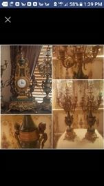Antique clock with to candelabras and green marble makes this a gorgeous Decor in your home