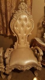 I have four chairs like this cream-colored leather and svorski Crystal period very heavy and large