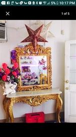 24 karat gold leaf console with marble top and matching mirror