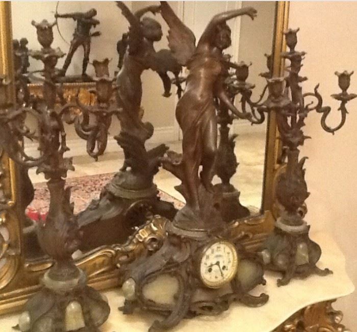 Antique clock and candelabras in Copper and bronze