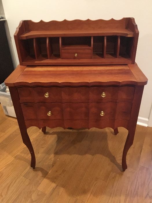 Handmade cherry carver my  Woodsmith's of North Carolina's . Charming and unique desk with sliding desk top  . Price $200.00