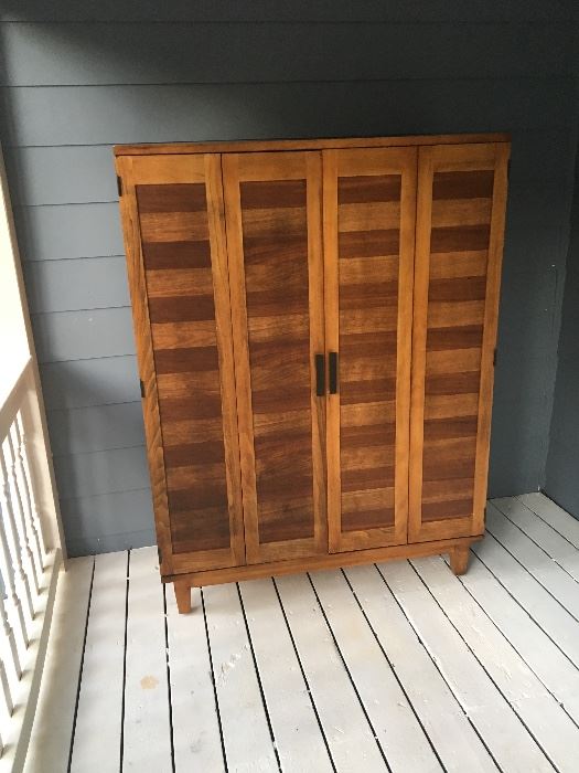 Beautiful wood armoire for storage or TV . Price $215.00