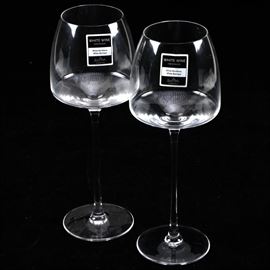 Rosenthal Studio-Line White Wine Glasses: A pair of Rosenthal handmade white wine glasses. Offered are two wine glasses with a wide bowl. The pieces are marked with a sticker and are etched “Rosenthal Studio-Line”.