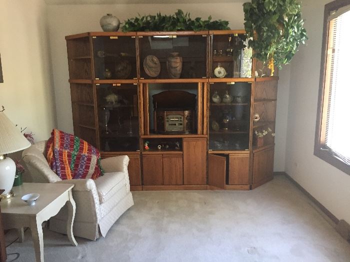 lots of nick knacks and Albums, large entertainment center