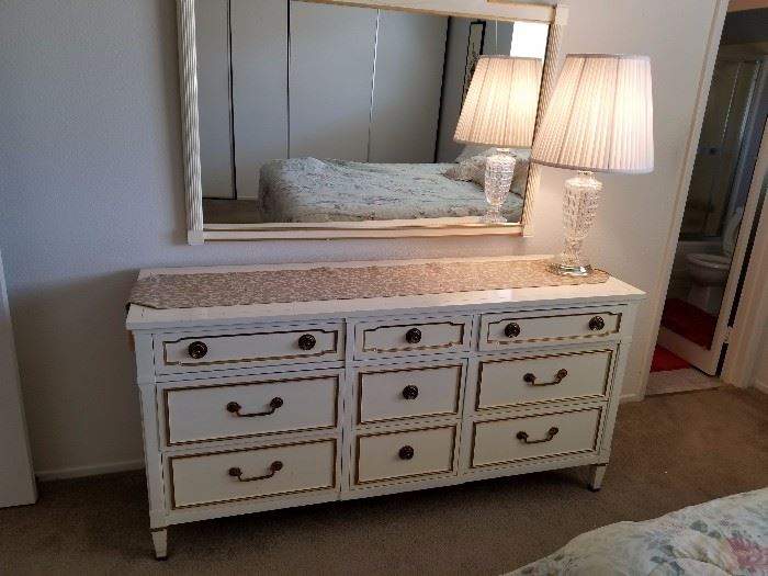 Dresser with mirror and lamp