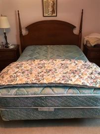 Full size bed with a like new comforter.  