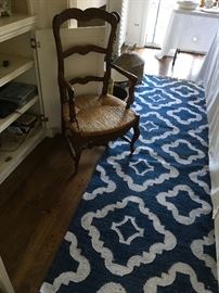 Large Pottery Barn woven rug in navy and white