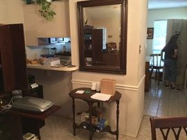 Wood frame mirror and small entry table