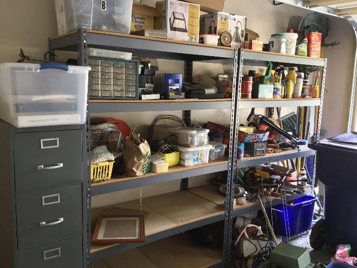 File cabinet and more shelves full in garage