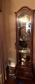 One of a pair of matching Henredon Grandfather case curio cabinets 